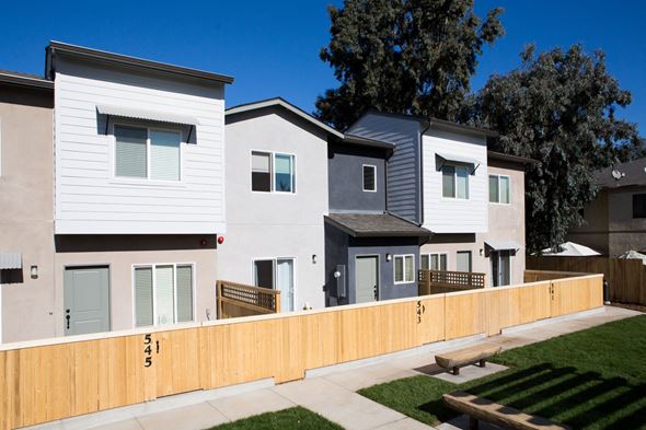 Nipomo house for rent - a row of town homes with a wooden fence