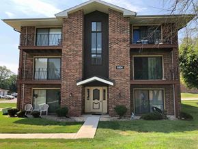 Oak Forest apartment for rent - A brick building with the number 5834 on it.