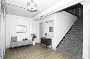 Oakland apartment for rent - A living room with a grey couch and a wooden table.