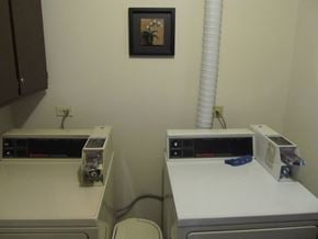 Oak Forest apartment for rent - the laundry room has two machines and two washes and a toaster