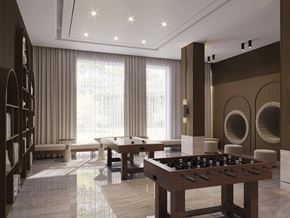 Laval apartment for rent - A room with a pool table and a foosball table.