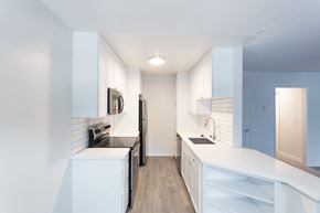 Los Angeles apartment for rent - Sleek kitchen in all white with small black accents