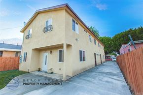 Los Angeles apartment for rent - A two-story house with a balcony on the second floor.