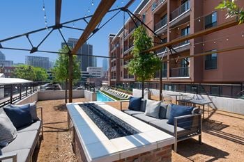 Rooftop lounge with views of victory park and downtown dallas