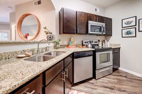 Austin apartment for rent - our apartments have a modern kitchen with granite counter tops and stainless steel appliances