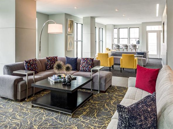 Dobbs Ferry apartment for rent - a living room with couches and chairs and a table