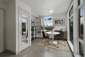Seattle apartment for rent - A dining room with a table and chairs.