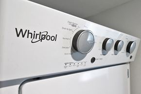 Oak Park apartment for rent - a whirlpool washer and dryer with a logo on the side of