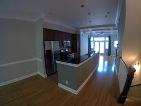 Atlanta house for rent - a kitchen and living room of an empty apartment