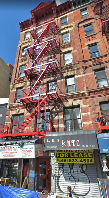 New York apartment for rent - a fire escape on the side of a building