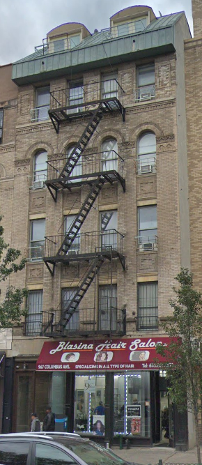 New York apartment for rent - a building with a fire escape on the side of it