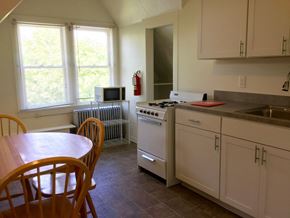 Ithaca apartment for rent - A kitchen with a table and chairs.