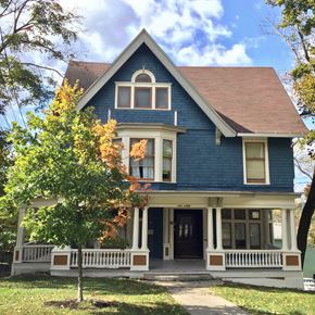 Ithaca apartment for rent - A blue house with white trim and a brown roof.