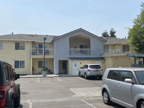 San Jose apartment for rent - a parking lot at the whispering winds apartments in pearland
