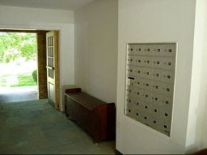 Ithaca apartment for rent - an empty room with a bench and a door