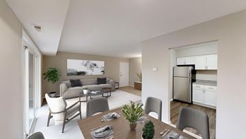 Martinsburg apartment for rent - a living room and dining room with a table and chairs