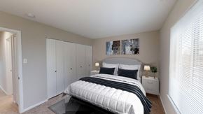 Martinsburg apartment for rent - a bedroom with a bed and a closet