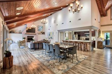 Westlake apartment for rent - a large living room with a dining room table and a kitchen