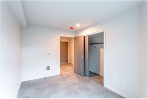 Seattle apartment for rent - a empty room with a closet and a door