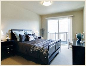 Seattle apartment for rent - a bedroom with a bed and a window