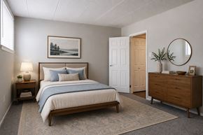 Pittsburgh townhouse for rent - A bedroom with a bed, nightstand, and dresser.