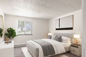 Pittsburgh apartment for rent - a bedroom with a large bed and a window