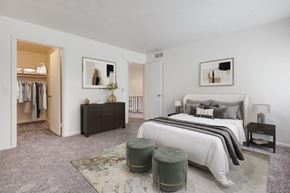 Rochester townhouse for rent - a bedroom with a bed and a closet