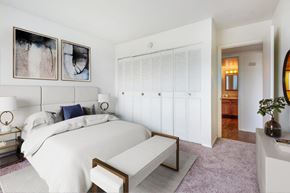 Syracuse apartment for rent - a bedroom with a bed and a closet