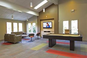 Tonawanda apartment for rent - a game room with a pool table and a tv