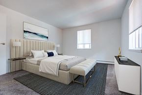Brockport townhouse for rent - staged bedroom with wall to wall carpeting