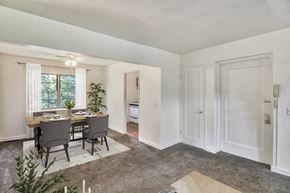 Rochester apartment for rent - dining area off of kitchen with carpet throughout