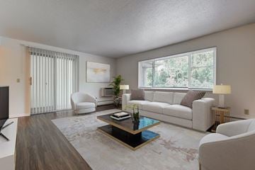 Henrietta apartment for rent - a living room with a couch and a table
