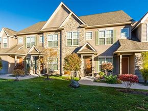Webster apartment for rent - A large, well-maintained house with a front yard and landscaping.