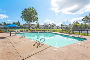Penfield apartment for rent - the swimming pool at our apartments has a resort style pool