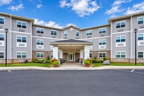 Rochester apartment for rent - The image shows a large building with a number 200 on it.