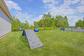 Rochester apartment for rent - the back yard has a playground and a picnic table