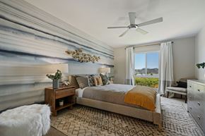 Mill Valley apartment for rent - a bedroom with a bed and a ceiling fan