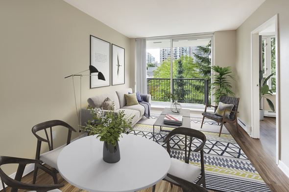 Vancouver apartment for rent - a living room with a couch and a table and a balcony