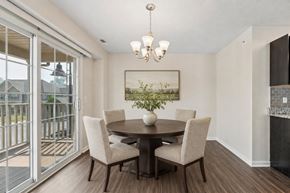 Victor apartment for rent - A dining room with a table and chairs.