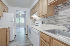 West Henrietta townhouse for rent - Kitchen with White Appliances with Oak Cabinets