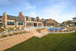 San Antonio apartment for rent - A large house with a pool in the backyard.