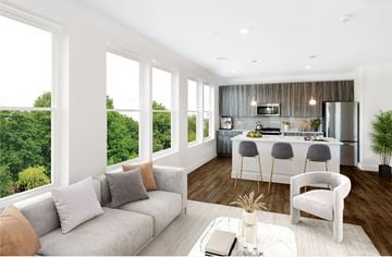 Glen Cove apartment for rent - a living room with a kitchen and a couch