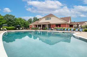 Canonsburg apartment for rent - a swimming pool with a house in the background