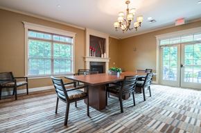 Canonsburg apartment for rent - a dining room with a table and chairs and a fireplace