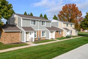 Elyria townhouse for rent - a row of houses on the side of a street