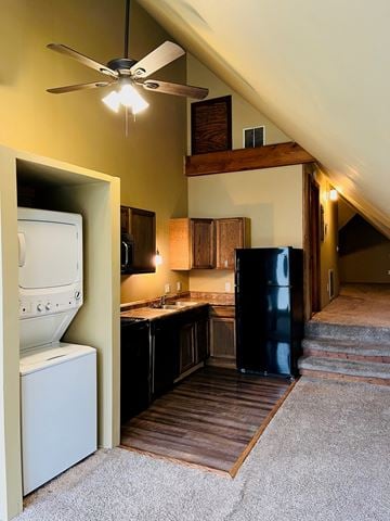 Jonesboro apartment for rent - A kitchen with a white dishwasher and black refrigerator.