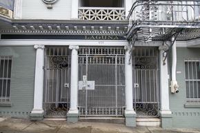 San Francisco apartment for rent - A building with a gate and a sign that says Laguna.