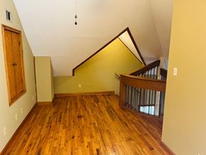Jonesboro apartment for rent - a living room with hard wood floors and a staircase