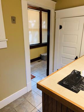 Jonesboro house for rent - the view from the kitchen into the living room with the door open