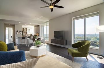 Atlanta apartment for rent - a living room with a couch and a chair and a television